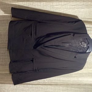 Black blazer with decorative pockets